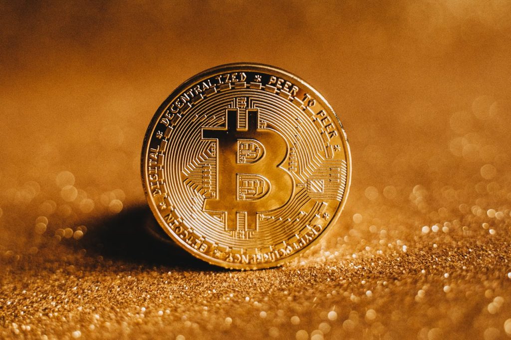 pexels-photo-6765363 Close-up Photo of a Gold Coin